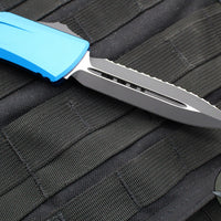 Microtech Combat Troodon Gen III OTF Knife- Double Edge- Blue Handle- Black Full Serrated Edge Blade 1142-3 BL Gen III 2024