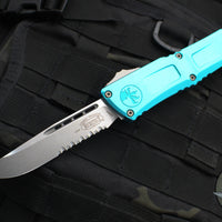 Microtech Combat Troodon Gen III OTF Knife- Single Edge- Turquoise Handle- Stonewash Part Serrated Blade 1143-11 TQ Gen III 2024