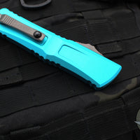 Microtech Combat Troodon Gen III OTF Knife- Single Edge- Turquoise Handle- Stonewash Part Serrated Blade 1143-11 TQ Gen III 2024