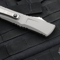 Microtech Combat Troodon Gen III OTF Knife- Tanto Edge- Natural Clear Finished Handle- Stonewash Blade 1144-10 NC Gen III 2024