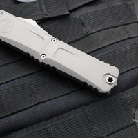 Microtech Combat Troodon Gen III OTF Knife- Tanto Edge- Natural Clear Handle- Apocalyptic Part Serrated Blade 1144-11 APNC Gen III 2024