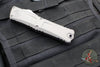 Microtech Combat Troodon Gen III OTF Knife- Tanto Edge- Natural Clear Handle- Stonewash Part Serrated Blade 1144-11 NC Gen III 2024