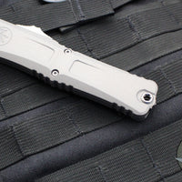 Microtech Combat Troodon Gen III OTF Knife- Tanto Edge- Natural Clear Handle- Stonewash Part Serrated Blade 1144-11 NC Gen III 2024