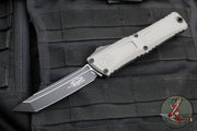 Microtech Combat Troodon Gen III OTF Knife- Tanto Edge- Natural Clear Finished Handle- Black Blade 1144-1 NCS Gen III