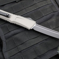 Microtech Combat Troodon Gen III OTF Knife- Tanto Edge- Natural Clear Finished Handle- Black Blade 1144-1 NCS Gen III 2024