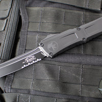 Microtech Combat Troodon Gen III OTF Knife- Tanto Edge- Tactical- Black Handle- Black Part Serrated Blade 1144-2 T Gen III