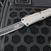 Microtech Combat Troodon Gen III OTF Knife- Tanto Edge- Natural Clear Finished Handle- Black Full Serrated Edge Blade 1144-3 NC Gen III