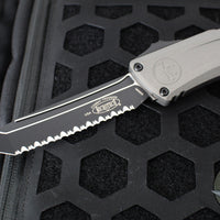 Microtech Combat Troodon Gen III OTF Knife- Tanto Edge- Natural Clear Finished Handle- Black Full Serrated Edge Blade 1144-3 NC Gen III