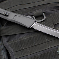 Microtech Combat Troodon Gen III OTF Knife- Tanto Edge- Tactical- Black Handle- Black Full Serrated Blade 1144-3 T Gen III