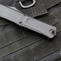 Microtech Combat Troodon Gen III OTF Knife- Tanto Edge- Tactical- Black Handle- Black Full Serrated Blade 1144-3 T Gen III