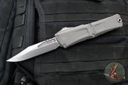 Microtech Combat Troodon Gen III OTF Knife- Bowie Edge- Natural Clear Finished Handle- Stonewash Plain Edge Blade 1146-10 NC Gen III