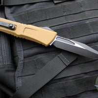 Microtech Combat Troodon Gen III OTF Knife- Bowie Edge- Tan Handle- Black Plain Edge Blade 1146-1 TA Gen III