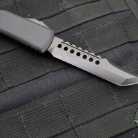 Microtech Ultratech OTF Knife- Hellhound Edge- Carbon Fiber Top- Sterile Black DLC Blade- Black Hardware 119-1 DLCTCFSH