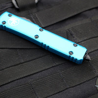 Microtech Ultratech OTF Knife- Single Edge- Turquoise Handle- Part Serrated Blade 121-2 TQ