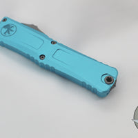 Microtech Combat Troodon Gen III OTF Knife- Interceptor Edge- Turquoise Handle- Apocalyptic Plain Edge Blade 1217-10 APTQS
