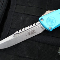 Microtech Combat Troodon Gen III OTF Knife- Interceptor Edge- Turquoise Handle- Stonewash Blade 1217-10 TQS Gen III