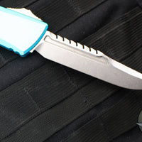 Microtech Combat Troodon Gen III OTF Knife- Interceptor Edge- Turquoise Handle- Stonewash Blade 1217-10 TQS Gen III