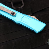 Microtech Combat Troodon Gen III OTF Knife- Interceptor Edge- Turquoise Handle- Stonewash Blade 1217-10 TQS Gen III