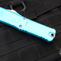 Microtech Combat Troodon Gen III OTF Knife- Interceptor Edge- Turquoise Handle- Stonewash Blade 1217-10 TQS Gen III