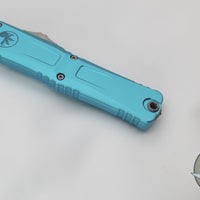 Microtech Combat Troodon Gen III OTF Knife- Interceptor Edge- Turquoise Handle- Stonewash Part Serrated Blade 1217-11 TQS