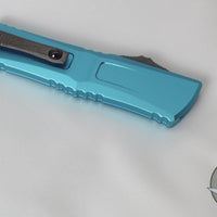 Microtech Combat Troodon Gen III OTF Knife- Interceptor Edge- Turquoise Handle- Apocalyptic Part Serrated Blade 1217-11 APTQS