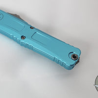 Microtech Combat Troodon Gen III OTF Knife- Interceptor Edge- Turquoise Handle- Apocalyptic Part Serrated Blade 1217-11 APTQS