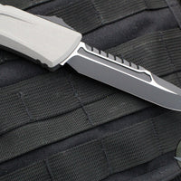 Microtech Combat Troodon Gen III OTF Knife- Interceptor Edge- Natural Clear Handle- Black Blade 1217-1 NCS