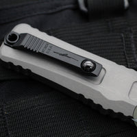 Microtech Combat Troodon Gen III OTF Knife- Interceptor Edge- Natural Clear Handle- Black Blade 1217-1 NCS