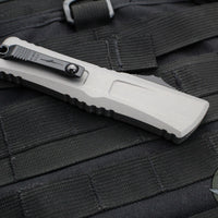 Microtech Combat Troodon Gen III OTF Knife- Interceptor Edge- Natural Clear Handle- Black Blade 1217-1 NCS