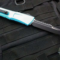 Microtech Combat Troodon Gen III OTF Knife- Interceptor Edge- Turquoise Handle- Black Blade 1217-1 TQS