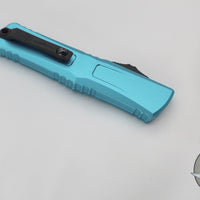 Microtech Combat Troodon Gen III OTF Knife- Interceptor Edge- Turquoise Handle- Black Part Serrated Blade 1217-2 TQS