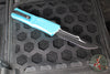 Microtech Combat Troodon Gen III OTF Knife- Interceptor Edge- Turquoise Handle- Black Part Serrated Blade 1217-2 TQS