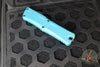 Microtech Combat Troodon Gen III OTF Knife- Interceptor Edge- Turquoise Handle- Black Part Serrated Blade 1217-2 TQS