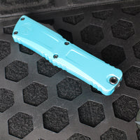 Microtech Combat Troodon Gen III OTF Knife- Interceptor Edge- Turquoise Handle- Black Part Serrated Blade 1217-2 TQS