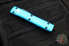 Microtech Ultratech OTF Knife- Double Edge- Turquoise Handle- Black Part Serrated Blade 122-2 TQ