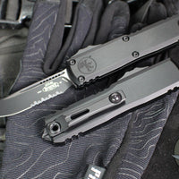 Microtech UTX-85 OTF Knife- GEN IV- Single Edge- Tactical- Black Handle- Black Part Serrated Blade 12314-2 T