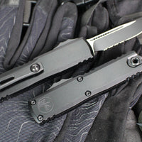 Microtech UTX-85 OTF Knife- GEN IV- Single Edge- Tactical- Black Handle- Black Part Serrated Blade 12314-2 T