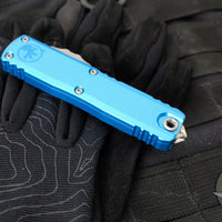 Microtech UTX-85 OTF Knife- GEN III- Double Edge- Blue Handle- Apocalyptic Full Serrated Blade 1232-12 APBL
