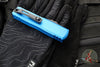 Microtech UTX-85 OTF Knife- GEN III- Double Edge- Blue Handle- Black Part Serrated Blade 1232-2 BL