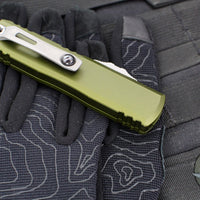 Microtech UTX-85 OTF Knife- GEN IV- Double Edge- OD Green Handle- Apocalyptic Part Serrated Blade 12324-11 APOD