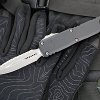 Microtech UTX-85 OTF Knife- GEN IV- Double Edge- Black Handle- Apocalyptic Full Serrated Blade 12324-12 AP