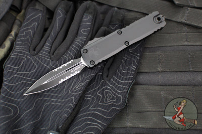 Microtech UTX-85 OTF Knife- GEN IV- Double Edge- Tactical- Black Handle- Black Part Serrated Blade 12324-2 T