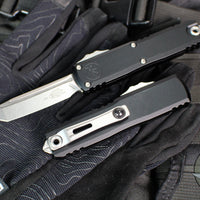 Microtech UTX-85 OTF Knife- GEN IV- Tanto Edge- Black Handle- Stonewash Finished Blade 12334-10