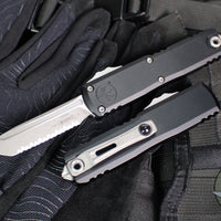 Microtech UTX-85 OTF Knife- GEN IV- Tanto Edge- Black Handle- Apocalyptic Full Serrated Blade 12334-12 AP