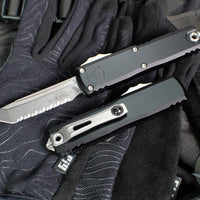 Microtech UTX-85 OTF Knife- GEN IV- Tanto Edge- Black Handle- Stonewash Full Serrated Blade 12334-12