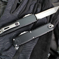 Microtech UTX-85 OTF Knife- GEN IV- Tanto Edge- Black Handle- Stonewash Full Serrated Blade 12334-12