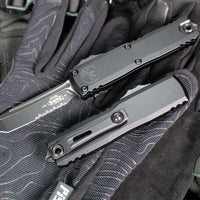Microtech UTX-85 OTF Knife- GEN IV- Tanto Edge- Tactical- Black Handle- Black Part Serrated Finished Blade 12334-2 T