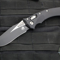 Microtech Knives- Amphibian Ram-Lok Folder- Fluted Black Aluminum Handle- Black Finished Blade 137RL-1 FL