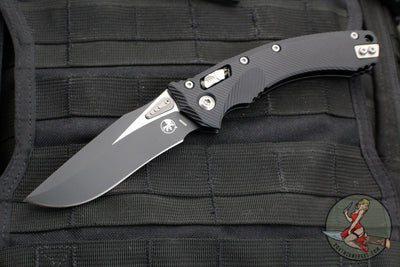 Microtech Knives- Amphibian Ram-Lok Folder- Fluted Black Aluminum Handle- Black Finished Blade 137RL-1 FL