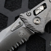 Microtech Knives- Amphibian Ram-Lok Folder- Fluted Carbon Fiber Handle- Black DLC Part Serrated Edge Blade 137RL-2 DLCTFLCFS